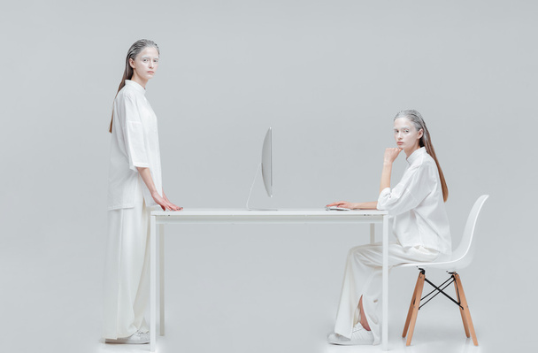 Two women using future technology  - Fotografie, Obrázek