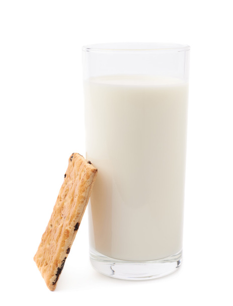 Glass of milk and cookie isolated over the white background - Photo, image