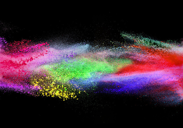 Explosion of colored powder on black background - Foto, imagen