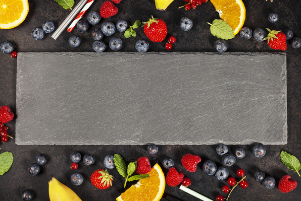 Cooking smoothie  on dark table - 写真・画像