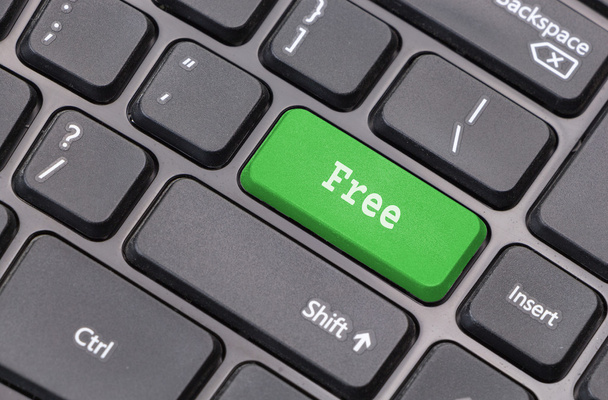 Computer keyboard closeup with "Free" text on green enter key - Photo, Image