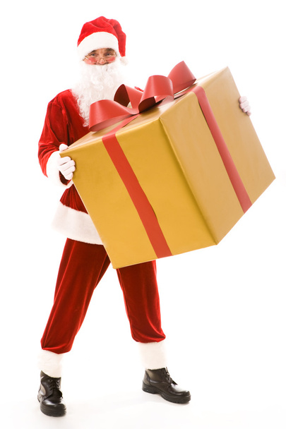 Babbo Natale con grande regalo
 - Foto, immagini