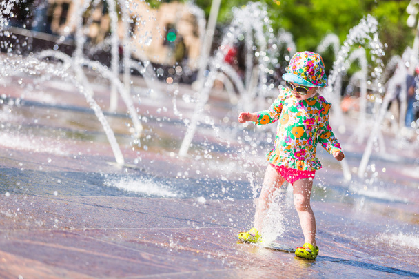 Toddler playing with fountains - Photo, Image