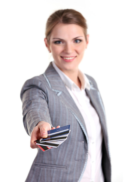 Young businesswoman holding plastic cards - Fotoğraf, Görsel