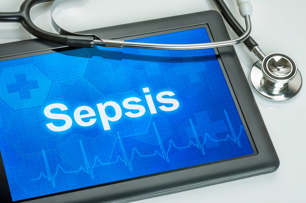 Comprimido con el diagnóstico Sepsis en la pantalla
 - Foto, Imagen