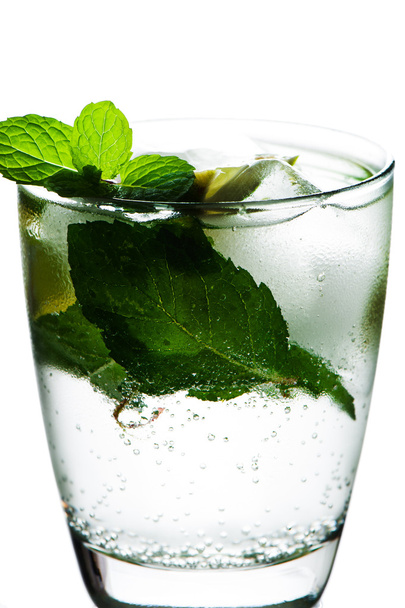 Closeup of soda water with limes and mint on White background - Foto, immagini