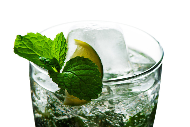 Closeup of water with limes and mint on White background - Foto, immagini