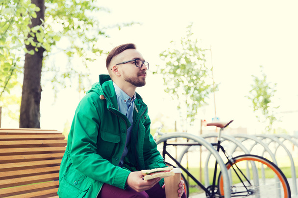 happy young hipster man with fixed gear bike - 写真・画像