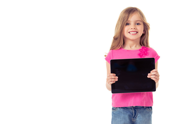 Cute little girl with gadget - Photo, image
