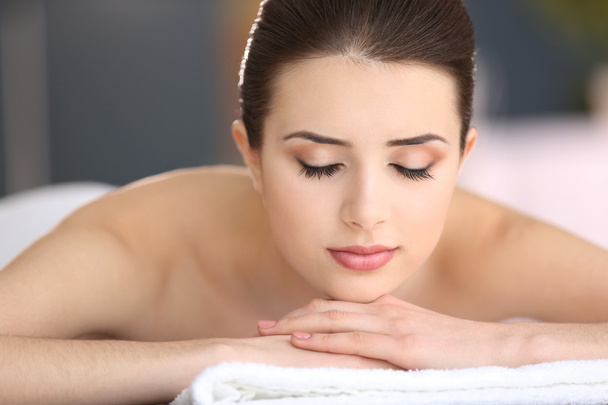 Woman relaxing in spa center - Photo, image