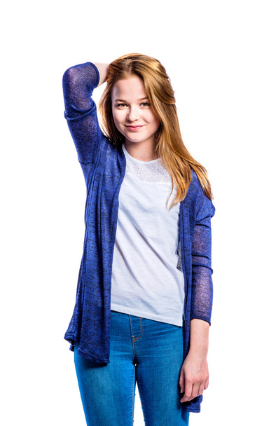 Girl in jeans and long sweater, woman, studio shot - Foto, afbeelding