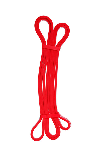 Kroucená červená zápěstí gumička izolované na bílém. - Fotografie, Obrázek