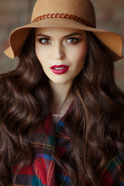 Portrait of a beautiful elegant woman brunette with brown eyes w - Foto, Imagen
