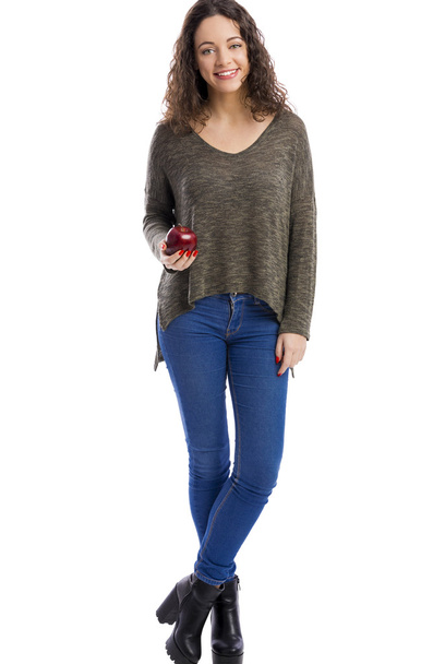 Woman holding a fresh red apple - Foto, immagini