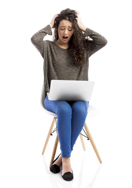 Woman working with a laptop - Фото, зображення
