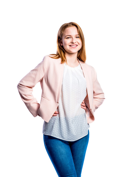 Girl in jeans and pink jacket, woman, studio shot - Fotografie, Obrázek