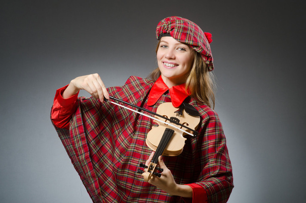 Nő skót ruházat zenei koncepció - Fotó, kép
