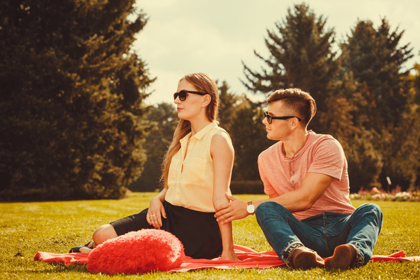 Moody girl with boyfriend in park.  - Valokuva, kuva