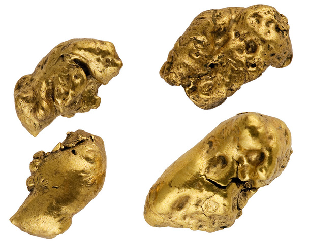 pepitas de oro sobre un fondo blanco
 - Foto, Imagen