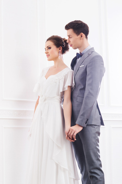 bride in white dress and handsome groom - Photo, Image