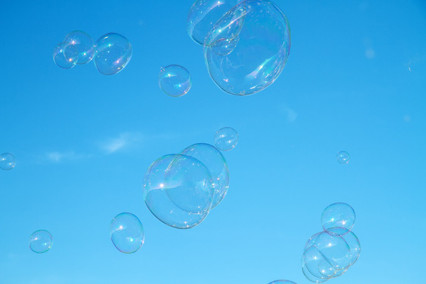 Many bubbles in blue sky - Photo, Image