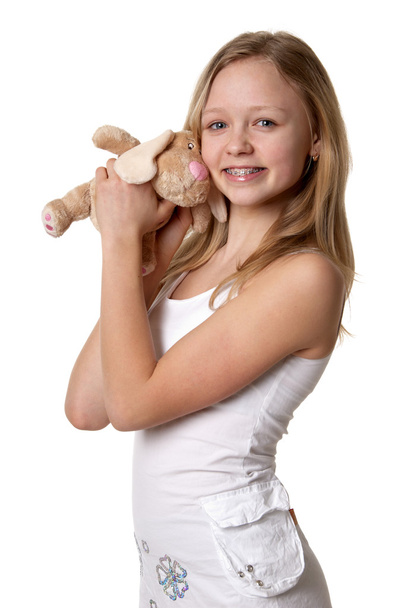 Girl and a fluffy bunny - Фото, зображення