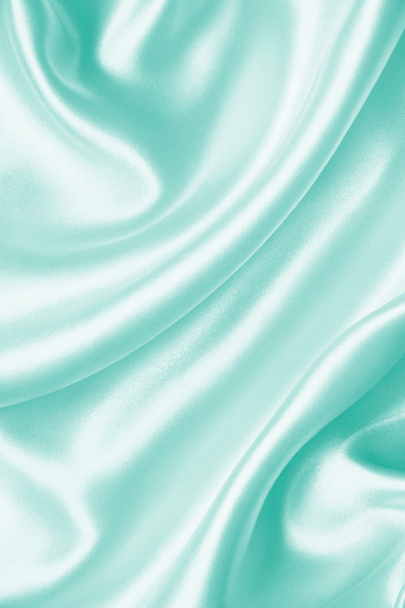 Smooth elegant blue silk or satin as background  - Фото, изображение