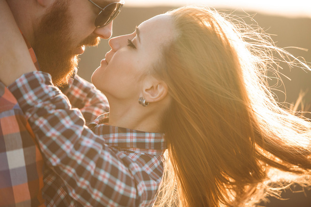 young couple kissing - 写真・画像