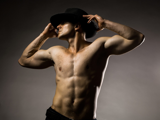 Sexy muscular man in hat - Foto, Imagem
