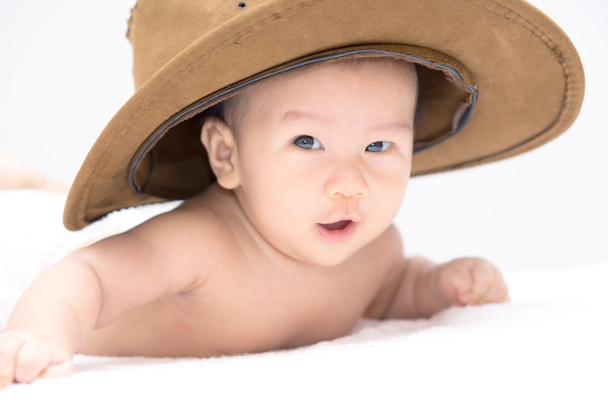 Asya bebek mide üzerinde yalan - Fotoğraf, Görsel
