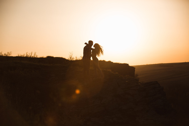 Young couple hugging - 写真・画像
