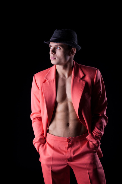 Sexy man in red suit - 写真・画像