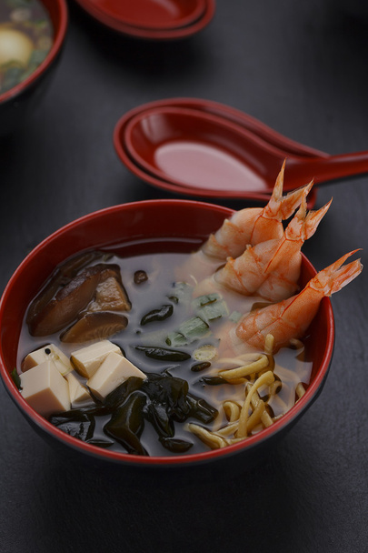 Japanese cuisine. Soup over black background. - Fotoğraf, Görsel
