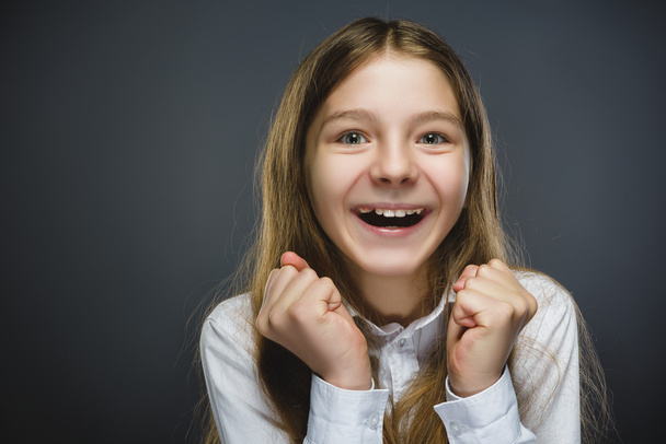 Closeup Portrait of happy girl going surprise isolated on gray background - Foto, Imagem