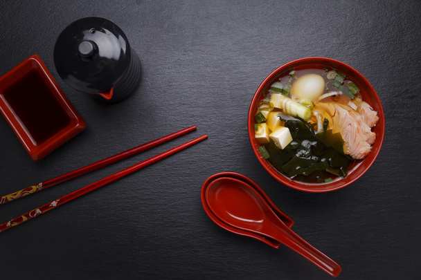 Japanese cuisine. Soup over black background. - Valokuva, kuva