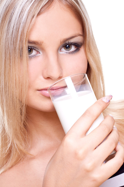Beautiful woman drinking milk - 写真・画像