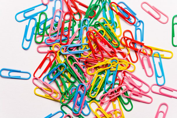 Colorful paperclips on white background - Fotó, kép