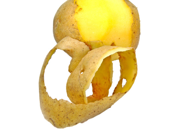 gedeeltelijk gepeld aardappel - Foto, afbeelding