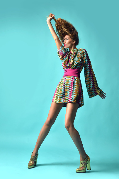 Young happy beautiful sexy woman posing in designer dress cloth  - Fotó, kép