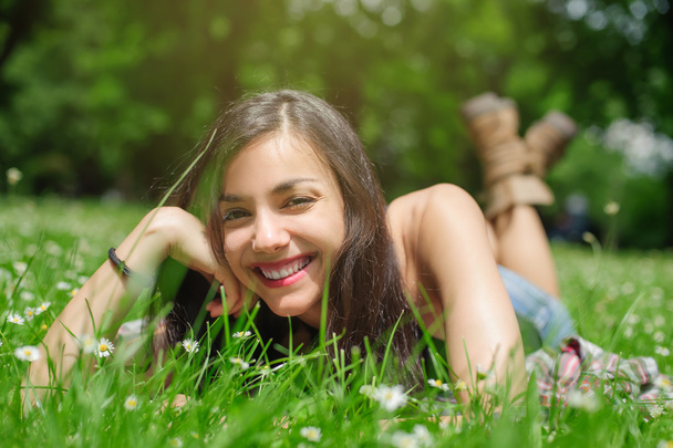 Girl resting in meadow - Photo, image