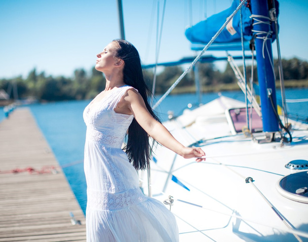 woman posing near  yacht - Zdjęcie, obraz