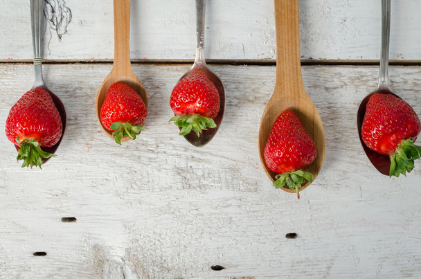 Strawberries on vintage spoons - Foto, Bild