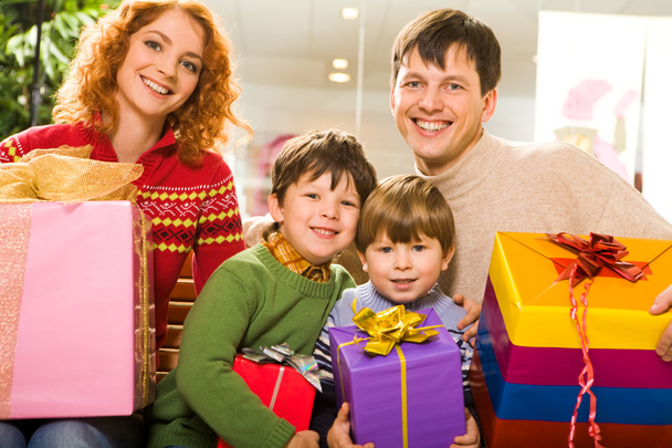 Family with presents - Фото, изображение
