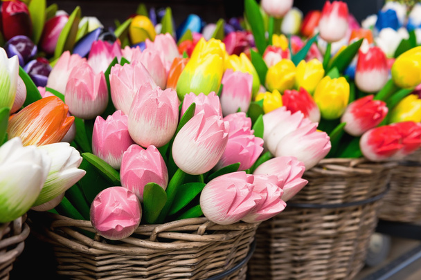 Multi-colored wooden tulips are popular souvenirs in the Netherlands - Photo, Image