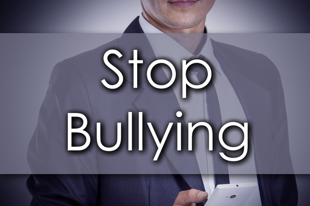 Stop Bullismo - Giovane imprenditore con testo - concetto di business
 - Foto, immagini