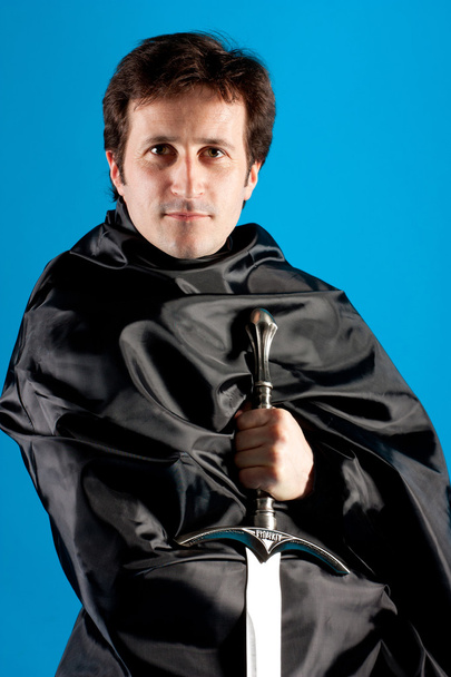 Portrait of man with knight sword - Photo, Image
