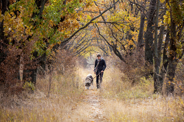 Man walking  with dog - Foto, imagen