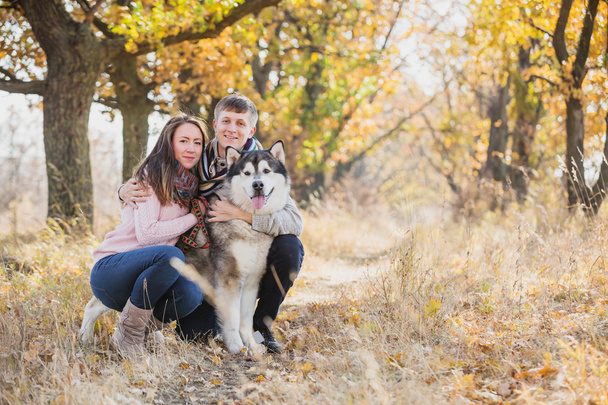 Young couple with dog - Foto, Bild