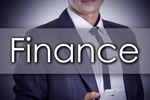 Finance - Young businessman with text - business concept - Photo, Image