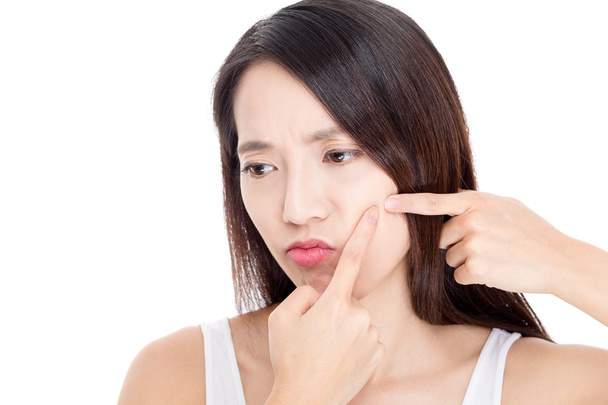 Asian woman squeezing pimple - Foto, Imagem